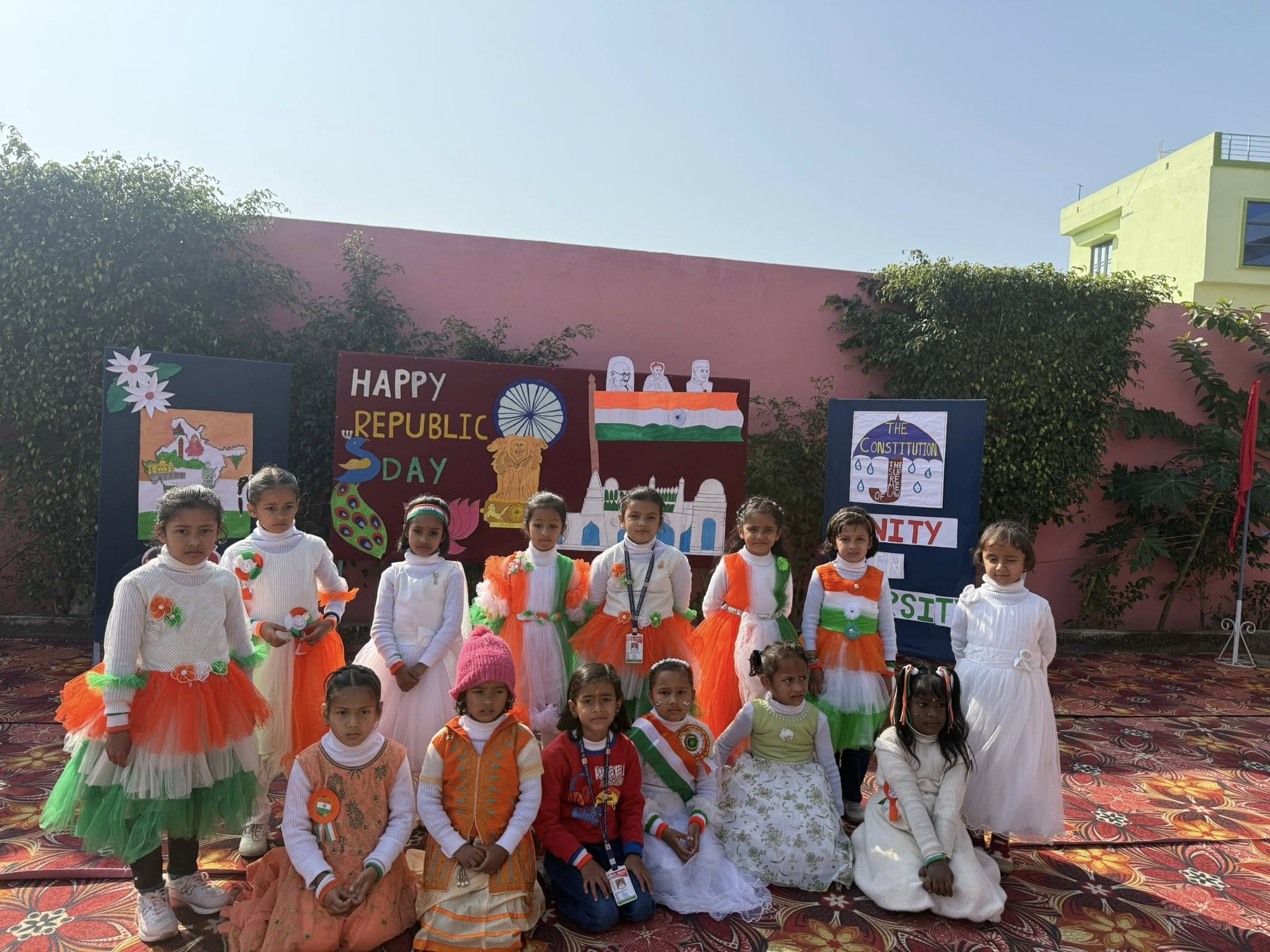 Girls in tricolour dresses celebrating Republic Day