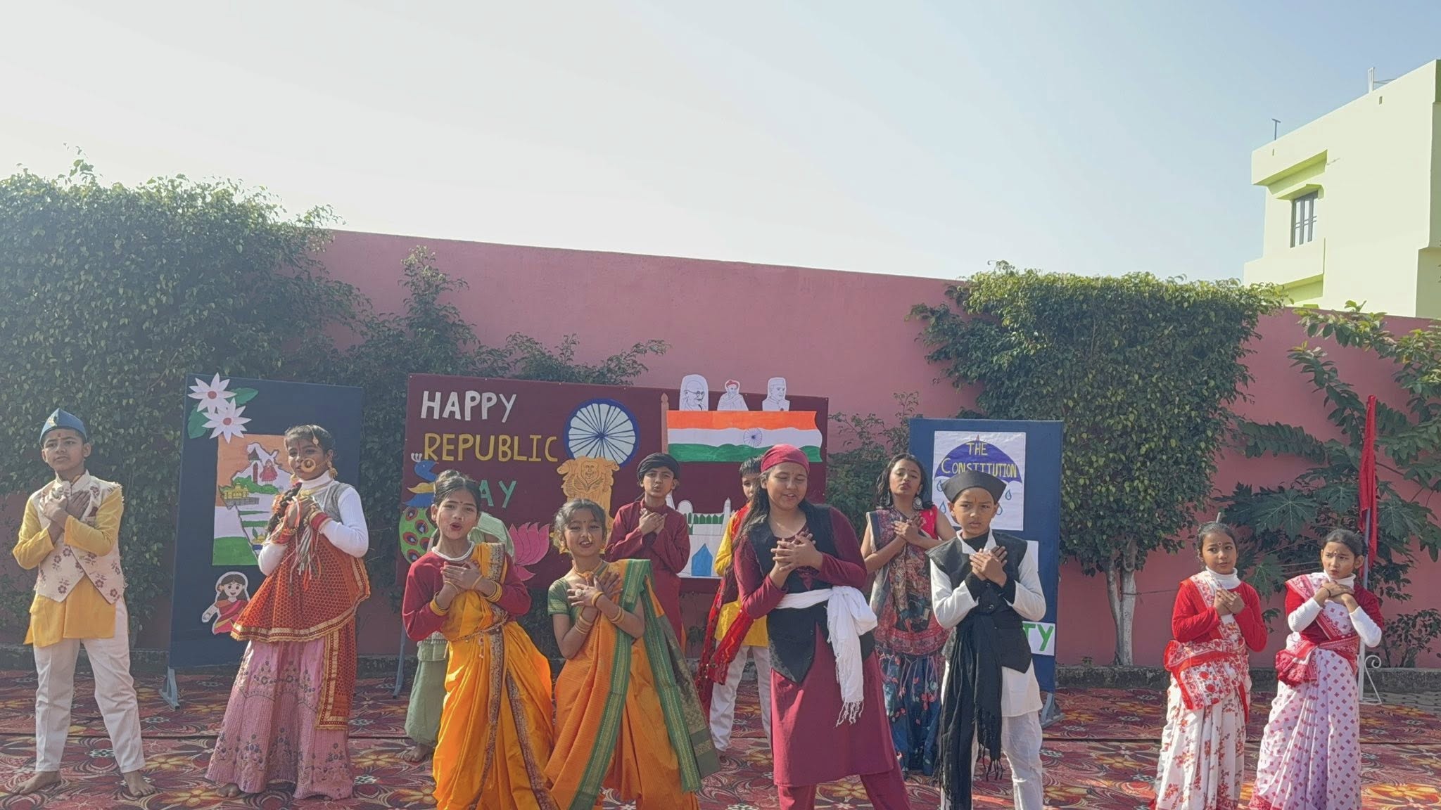 Students performing a cultural dance in colourful traditional costumes on Republic Day