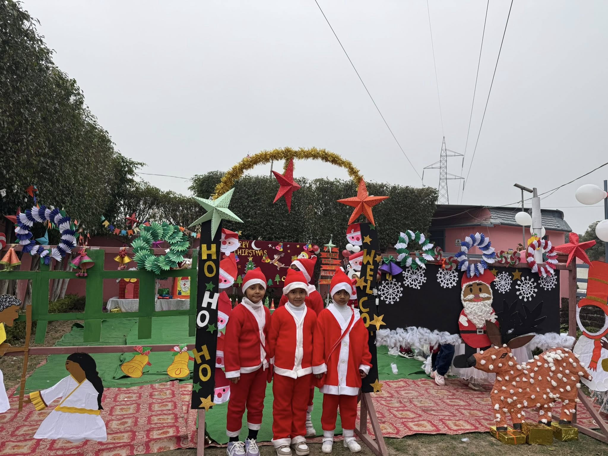 Children dressed as Santa Claus at a cheerful Christmas celebration